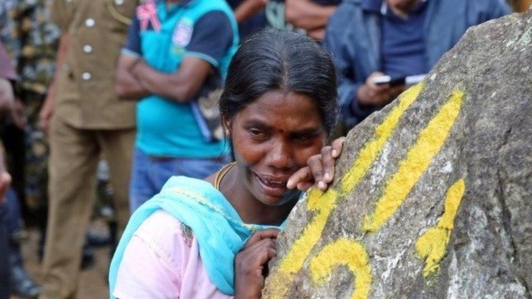Woman affected by landslide in Sri Lanka, 30 October 2014