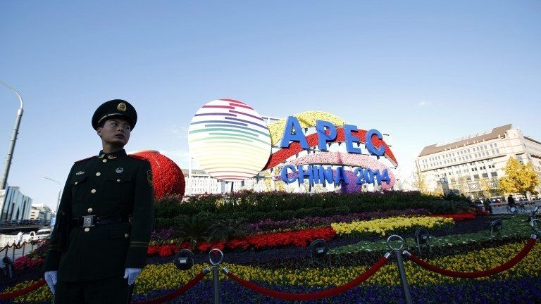 Policeman guards Apec installation in Beijing - 6 November