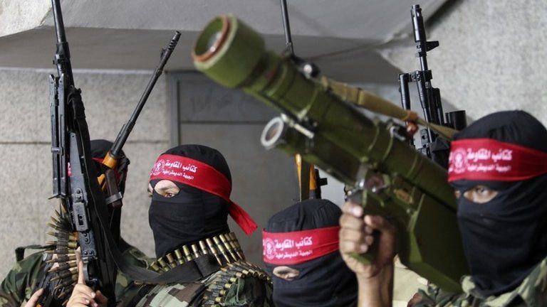 Militants from the Popular Front for the Liberation of Palestine (PFLP) take part in a parade in Gaza City (2 September 2014)