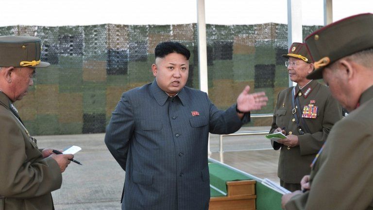 North Korean leader Kim Jong-un (C) guides the actual parachuting and striking drill of paratrooper units of the KPA in this undated photo released by North Korea"s Korean Central News Agency (KCNA) August 28, 2014