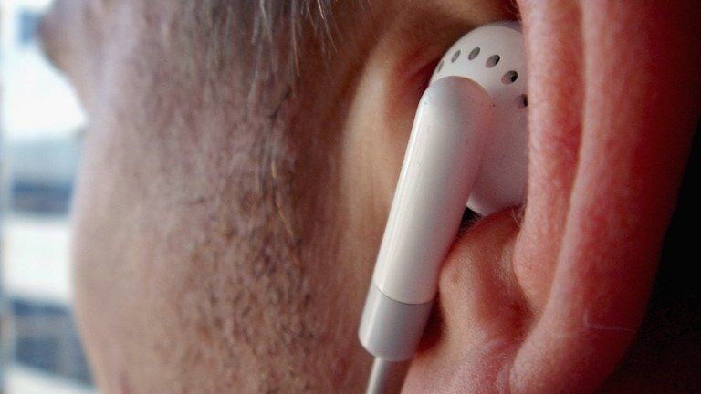 Close-up of ear with earphones