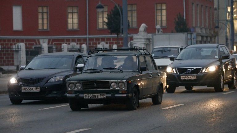 Lada car driving down street in Moscow