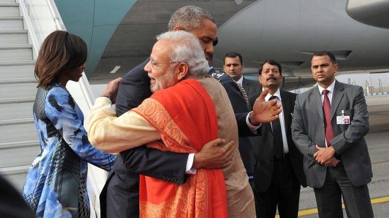 President Barack Obama is greeted by Indian Prime Minister Narendra Modi at Delhi airport