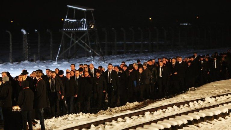 Delegations make their way to lay candles at the Birkenau Memorial, 27 January