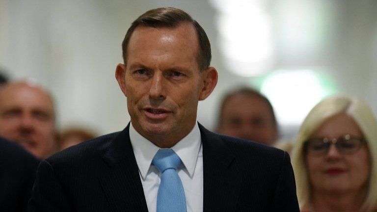 Australian Prime Minister Tony Abbott arrives for a special Liberal party room meeting at Parliament House in Canberra, Australia, on 09 February 2015