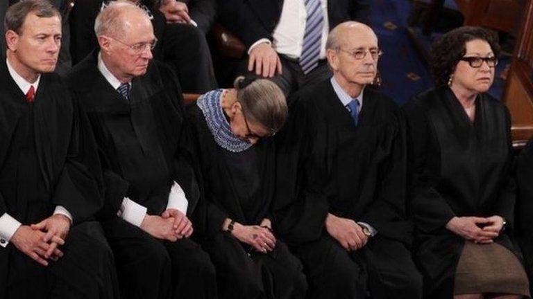 Supreme Court Justice Ruth Bader Ginsburg, centre, dozes during President Barack Obama's State of the Union address on Capitol Hill in Washington on 20 January 2015
