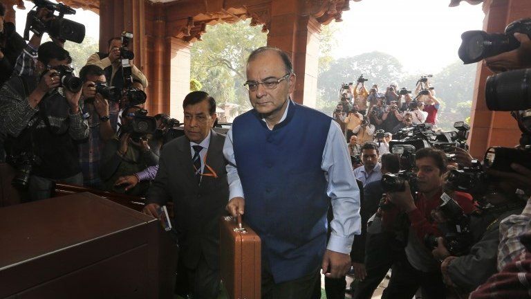 Indian Finance Minister Arun Jaitley arrives at the Parliament House to present Union Budget for the year 2015-16, in New Delhi, India, Saturday, Feb. 28, 2015