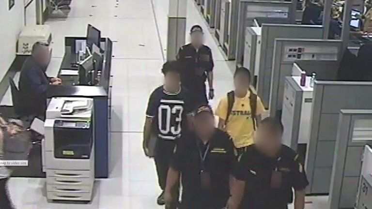 Two teenage brothers suspected of trying to fly to the Middle East to fight at Sydney airport, 8 March 2015