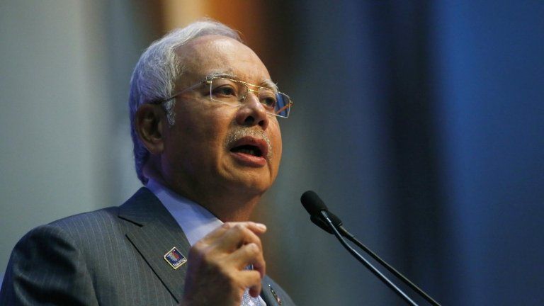 Malaysian Prime Minister Najib Razak speaks at a news conference to announce budget revisions to help its oil exporting economy adjust to the impact of slumping global crude prices, in Putrajaya on 20 January 2015