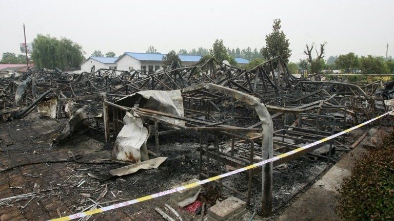 Remains of burned building in Pingdingshan, China (26 May 2015)
