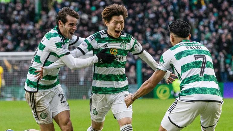 Celtic's Kyogo Furuhashi celebrates with Paulo Bernardo and Luis Palma