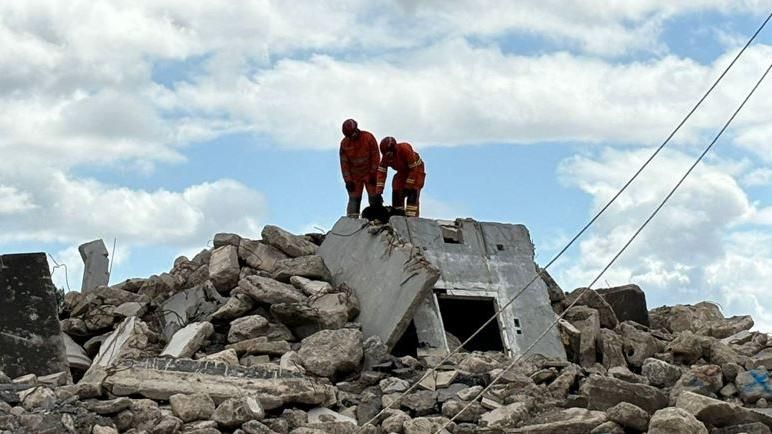 Two men undertaking search and rescue demonstration