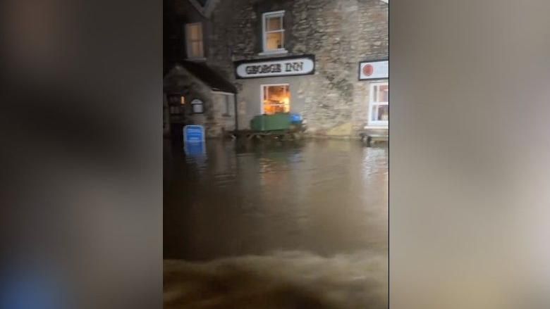 Water flowing into the George Inn