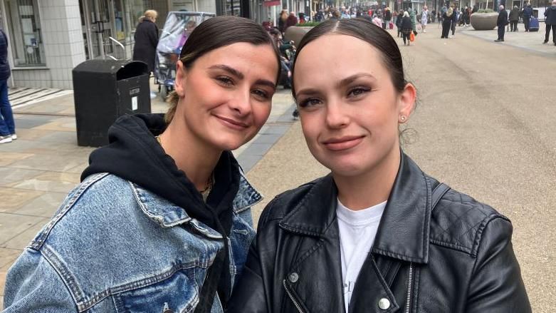 Two mums pictured smiling on Scarborough high street