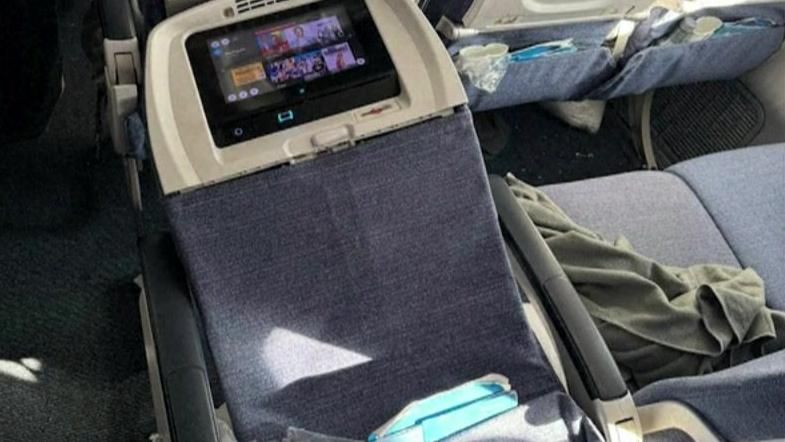 A damaged seat of the Air Europa Boeing 787-9 Dreamliner's flight from Madrid to Montevideo