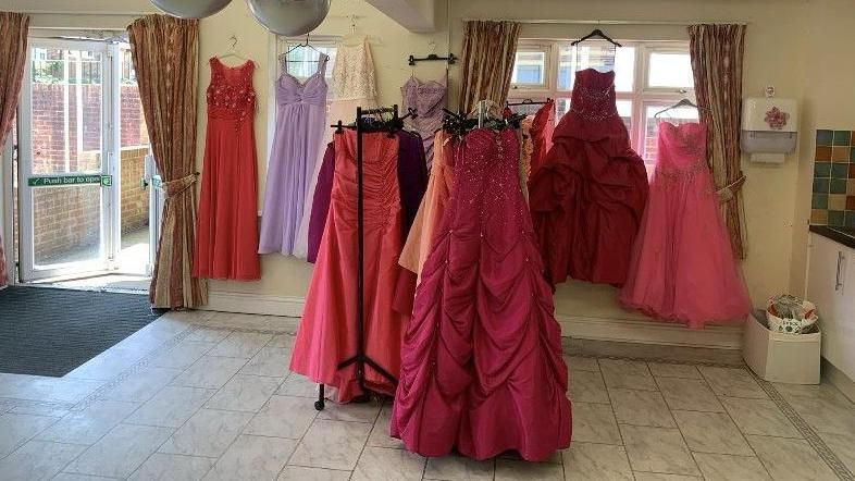 Prom dresses hang in the former care home