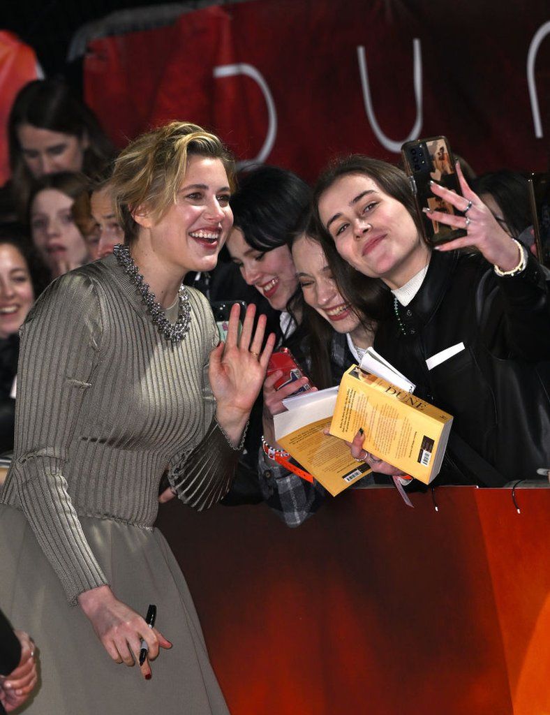 Greta Gerwig signs autographs at the Dune: Part Two premiere