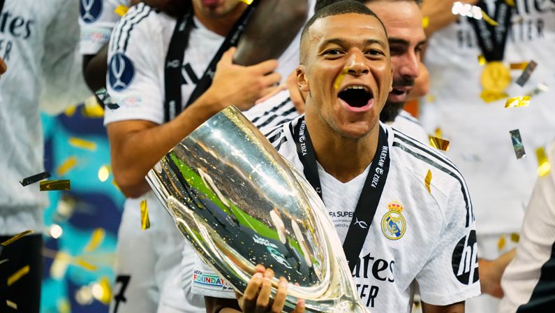 Kylian Mbappe with the Super Cup