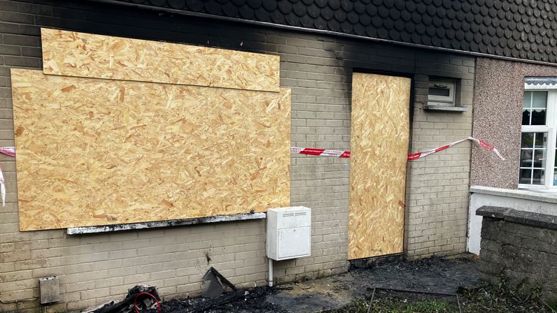 A fire damaged exterior of a two-storey house in Rosemount