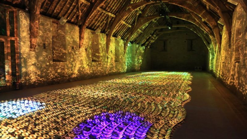 Artist Bruce Munro lights up ancient barn - BBC News