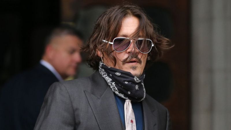 Johnny Depp denies slapping ex-wife for laughing at his tattoo - BBC News