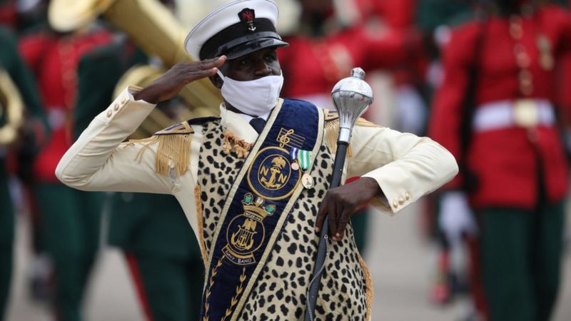 A member of the Nigerian Navy Force band salutes at the Eagles Square in Abuja, Nigeria during the countrys 60th Independence Celebration on October 1, 2020