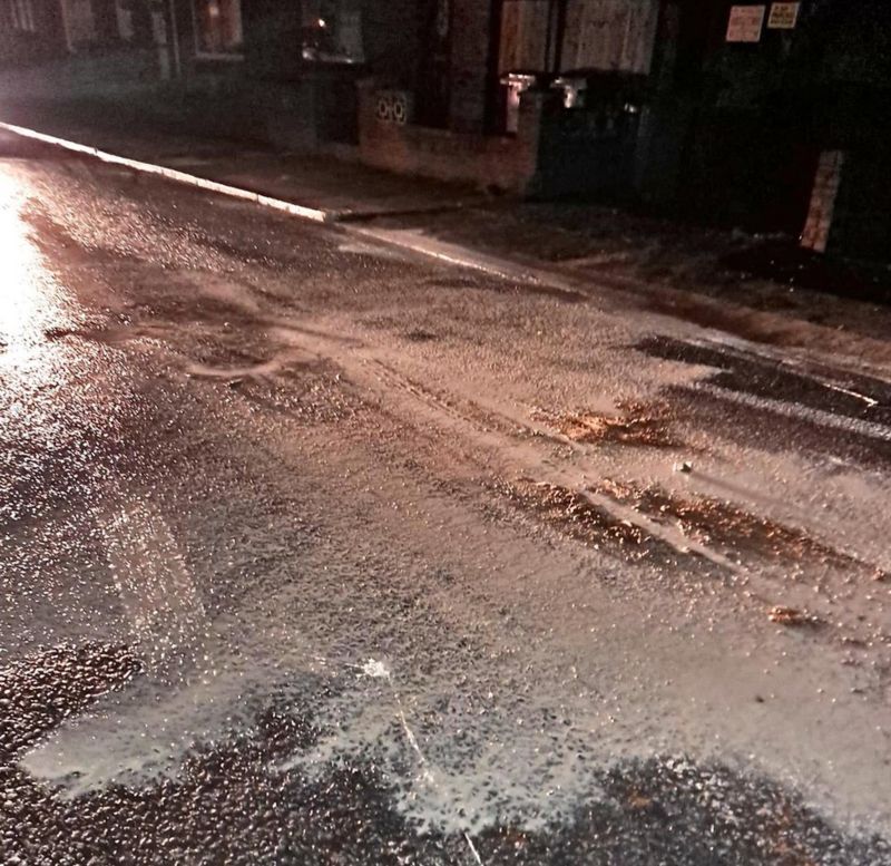 'Huge spillage' of paint turns Fazakerley road white BBC News