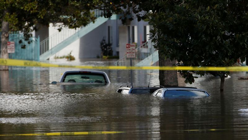 San Jose flooding: Dozens rescued by boat - BBC News