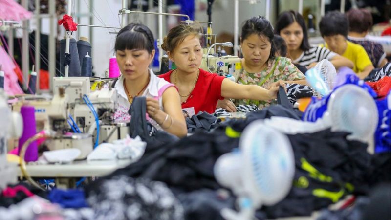 This photo taken on August 2, 2018 shows workers at a swimwear factory in Yinglin town in Jinjiang, in China's eastern Fujian Province.