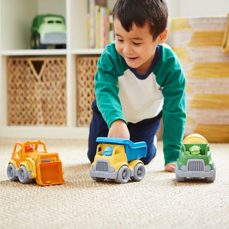 Green toys trucks made from recycled plastic.