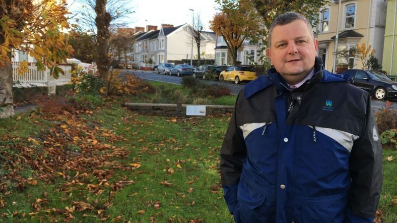 Steve Wilson, managing director of Welsh Water, in front of one of the 'planters'