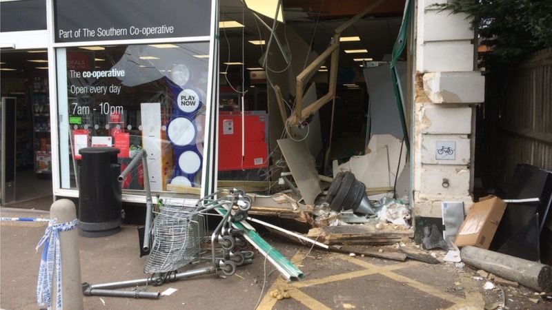 Liphook JCB ram raid: Three held after Co-Op cashpoint theft - BBC News