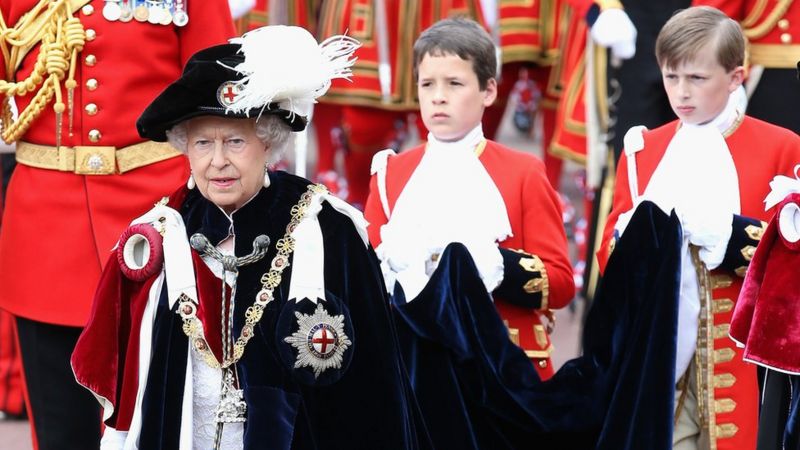 Queen attending a service for the Order of the Garter