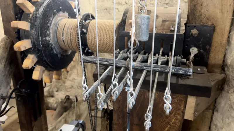 The carillon linked to the clock that plays the church bells every quarter hour to tell the time.