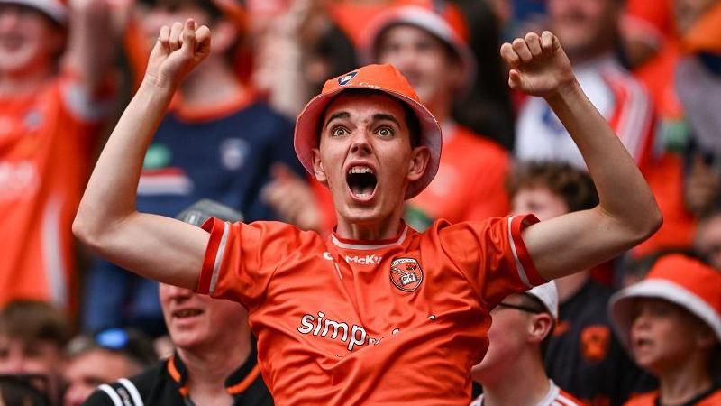 Young Armagh GAA fan cheering