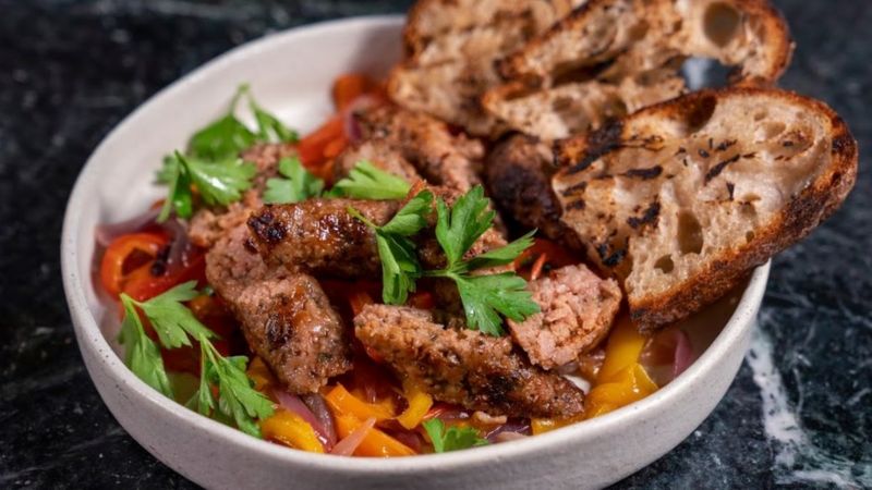 An Italian sausage dish made with plant-based meat