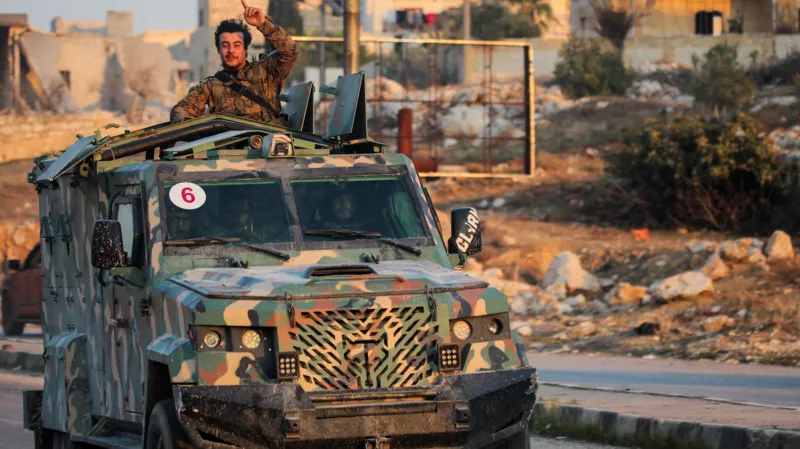 Who are the rebels seizing control of Syria's second city?