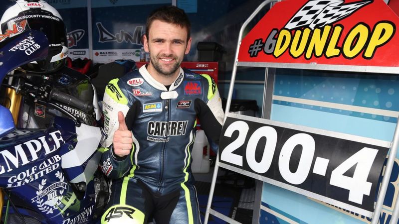 Thousands attend funeral for road racer William Dunlop - BBC News