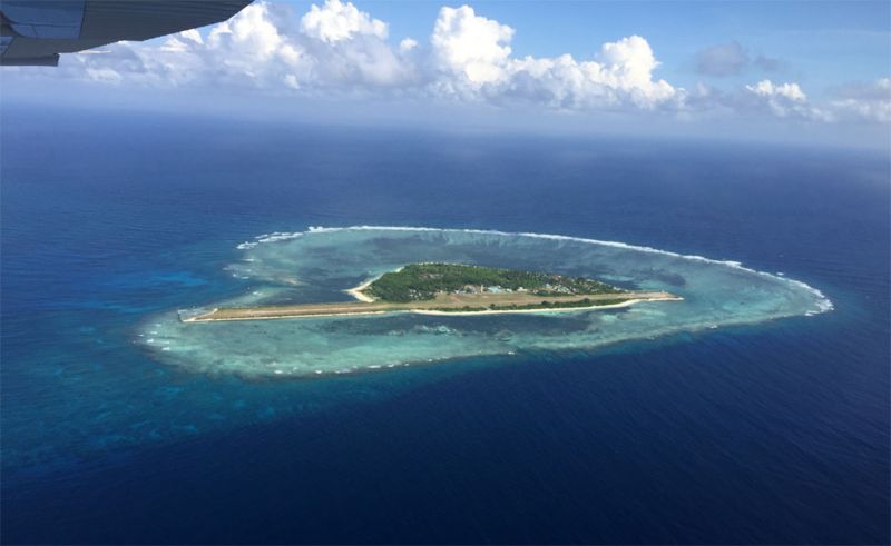 Flying close to Beijing's new South China Sea islands - BBC News