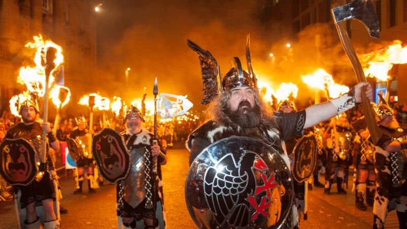 Hogmanay procession in Edinburgh with men dressed as Vikings.