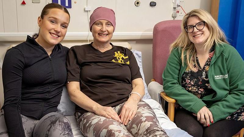 Ruth with daughter Natasha and Kelly (in green Macmillan jacket).