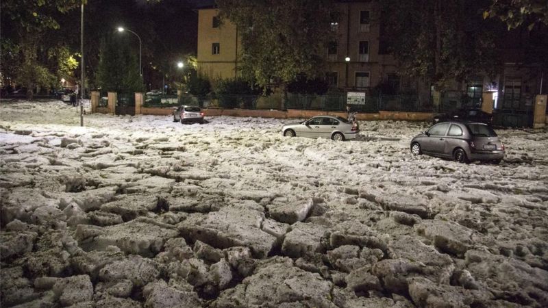 In pictures: Rome suffers freak hailstorm and flooding - BBC News