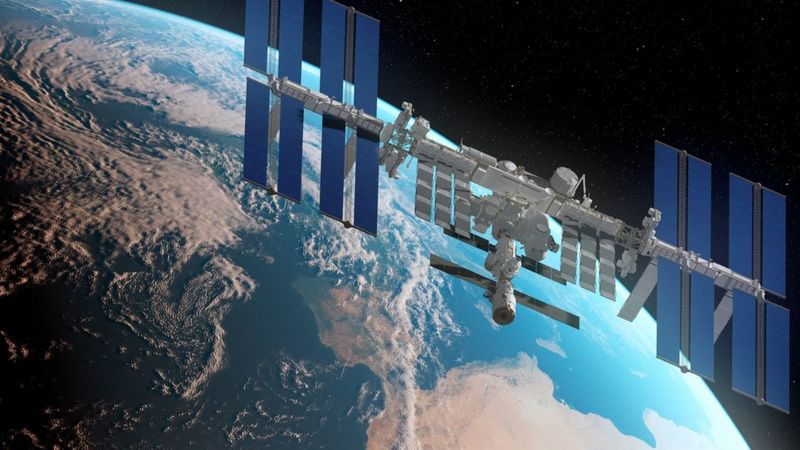 The ISS orbiting the earth