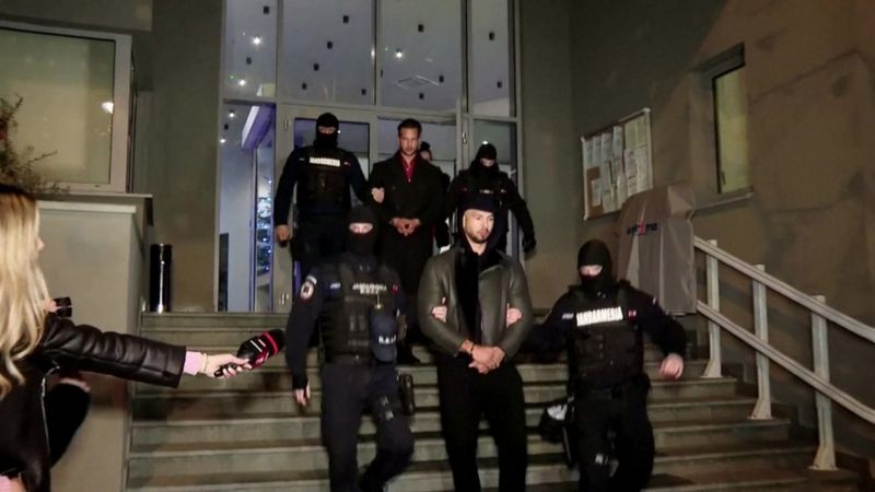 Andrew Tate: Romanian police to hold influencer for 30 days - BBC News