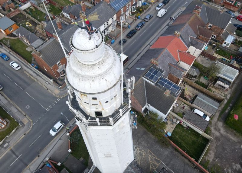 Withernsea Lighthouse Drone snaps birdseye view of new paint job BBC