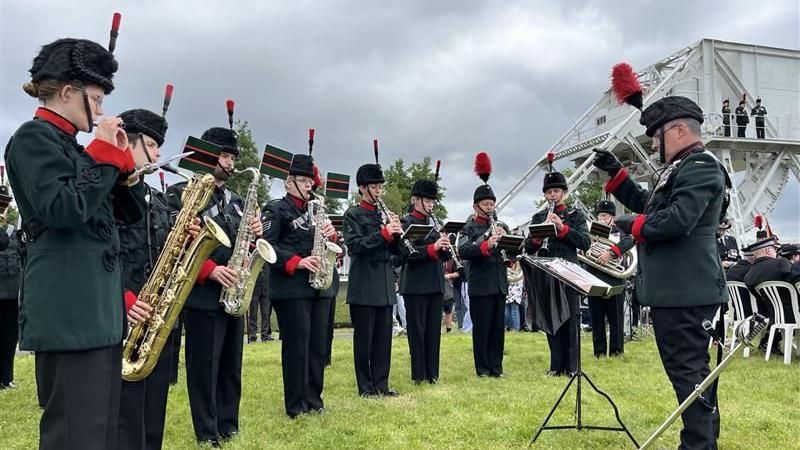 A brass band performs at the Pegasus Bridge memorial ceremony