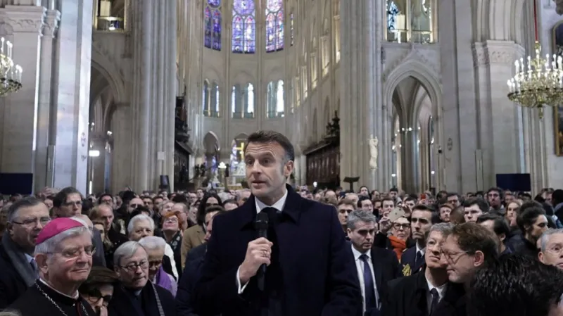 Embattled Macron seeks boost from Notre Dame reopening