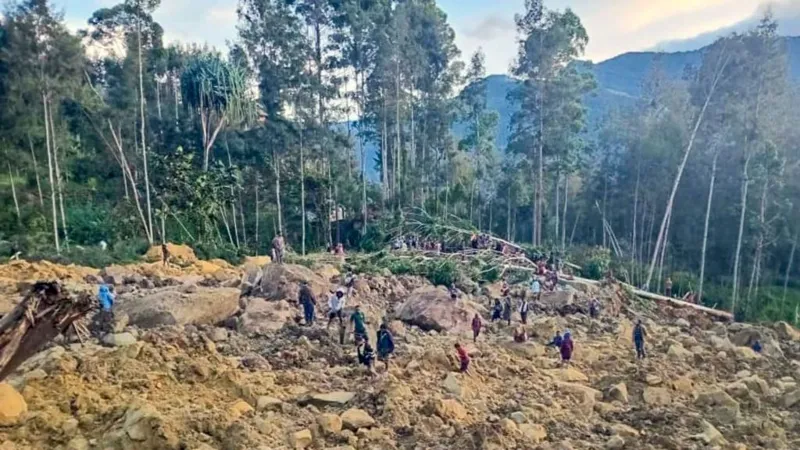 Race to rescue villagers trapped after deadly landslide