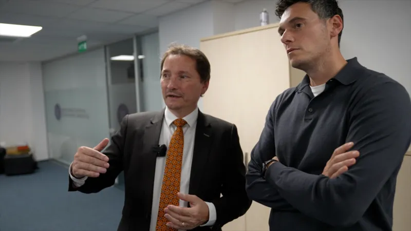 As head of Romania's Cyber-Security Directorate Dan Cimpean (L) was in charge of co-ordinating the crisis response