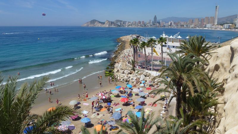 Wanted Manchester man found in Benidorm hotel after huge manhunt - BBC News